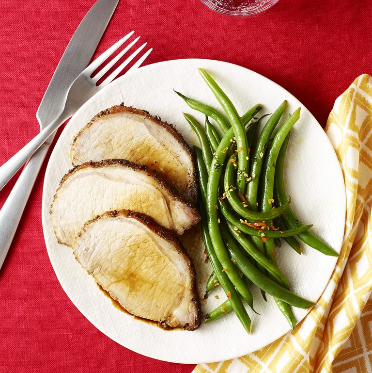 beans and roasted turkey on the plates